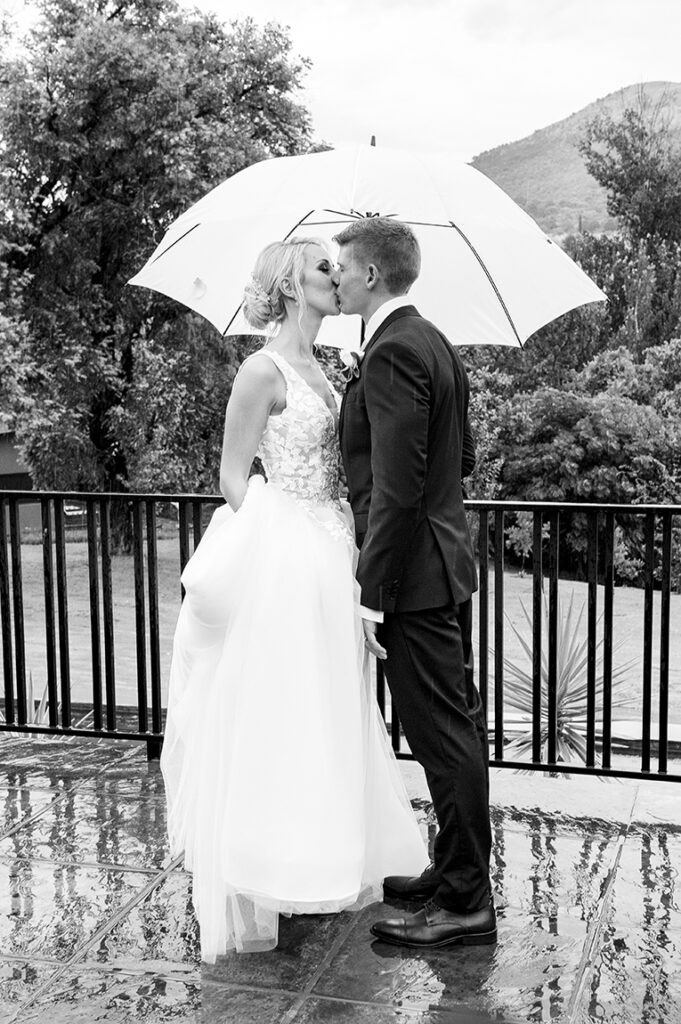 Candid moment black and white for M&L wedding by Kevin Mark Pass Photography, bridal makeup by Storm Pass